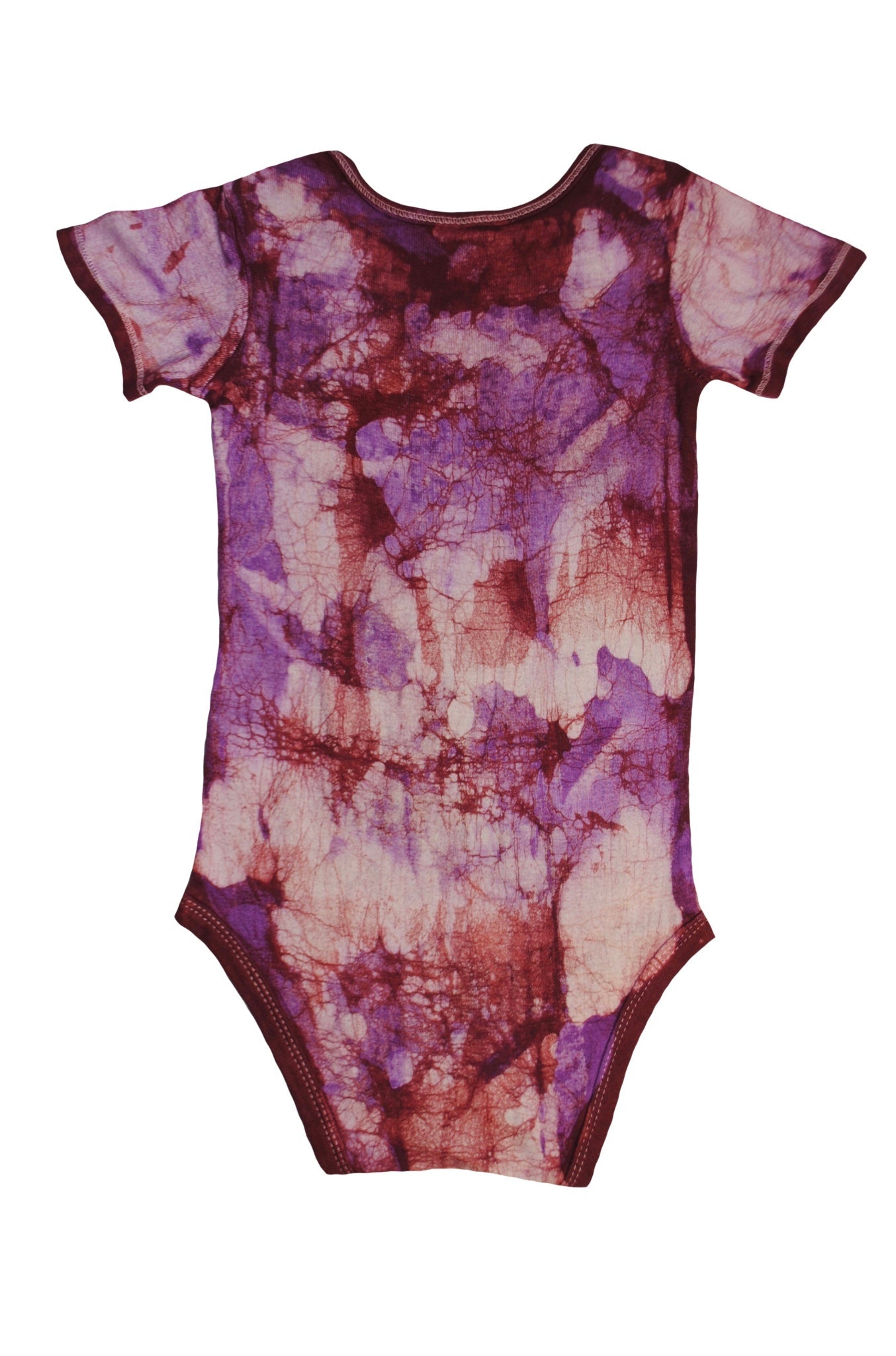 Detail of hand-dyed batik on red pink monkey onesie back