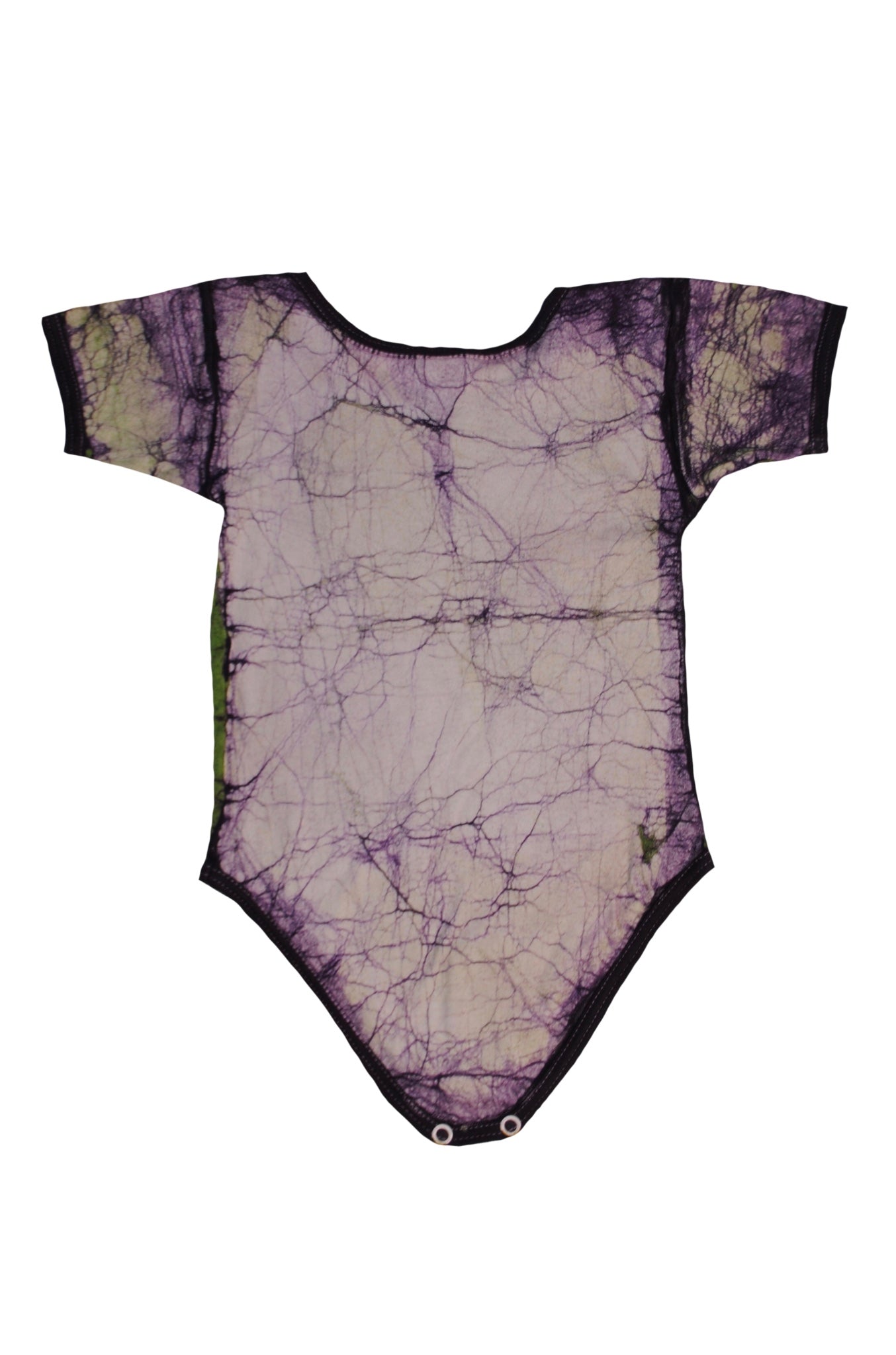 Close-up of green monkey onesie showing batik details and snap closures