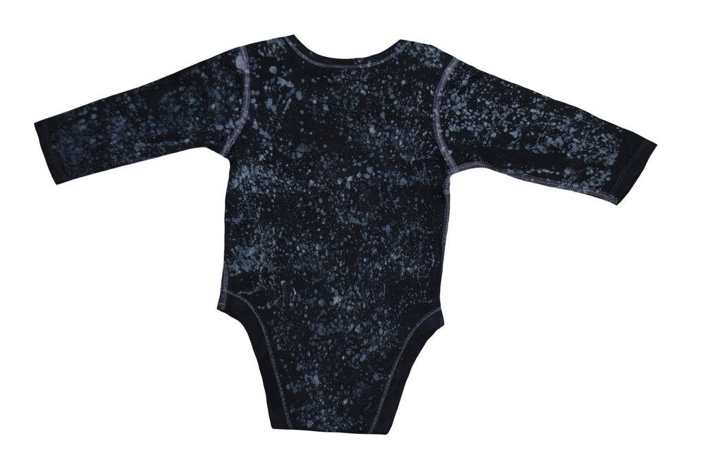 Detail of hand-dyed batik on blue bear onesie back