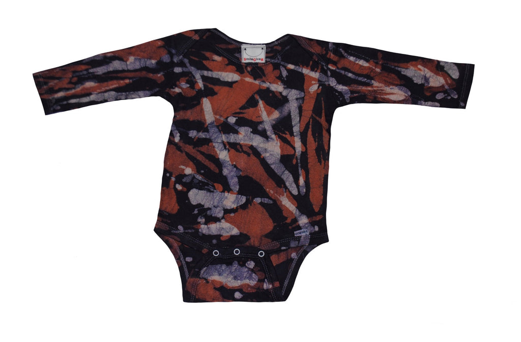 Back view of orange grey camo batik onesie with traditional patterns