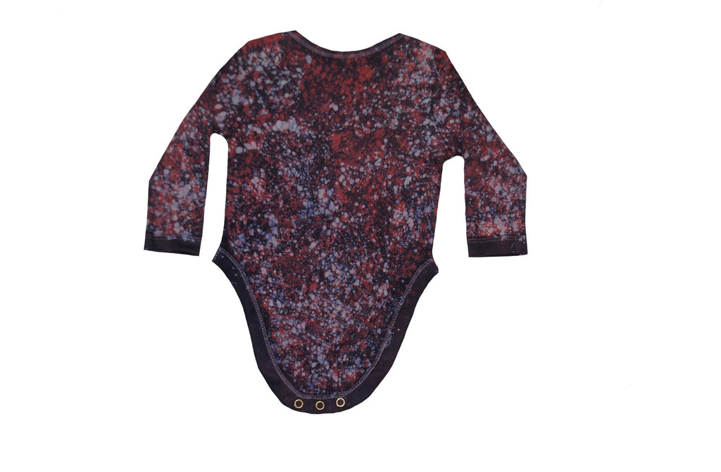 Folded back view of red blue monkey batik onesie