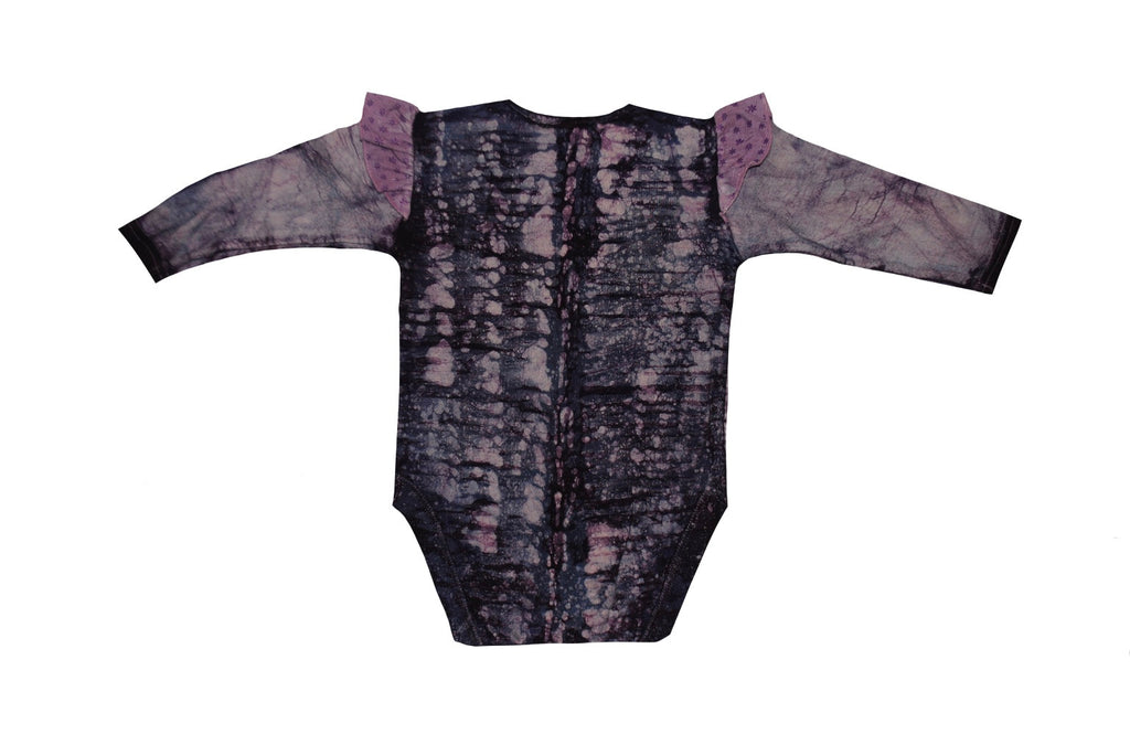 Detail of hand-dyed batik on purple dual fish onesie back