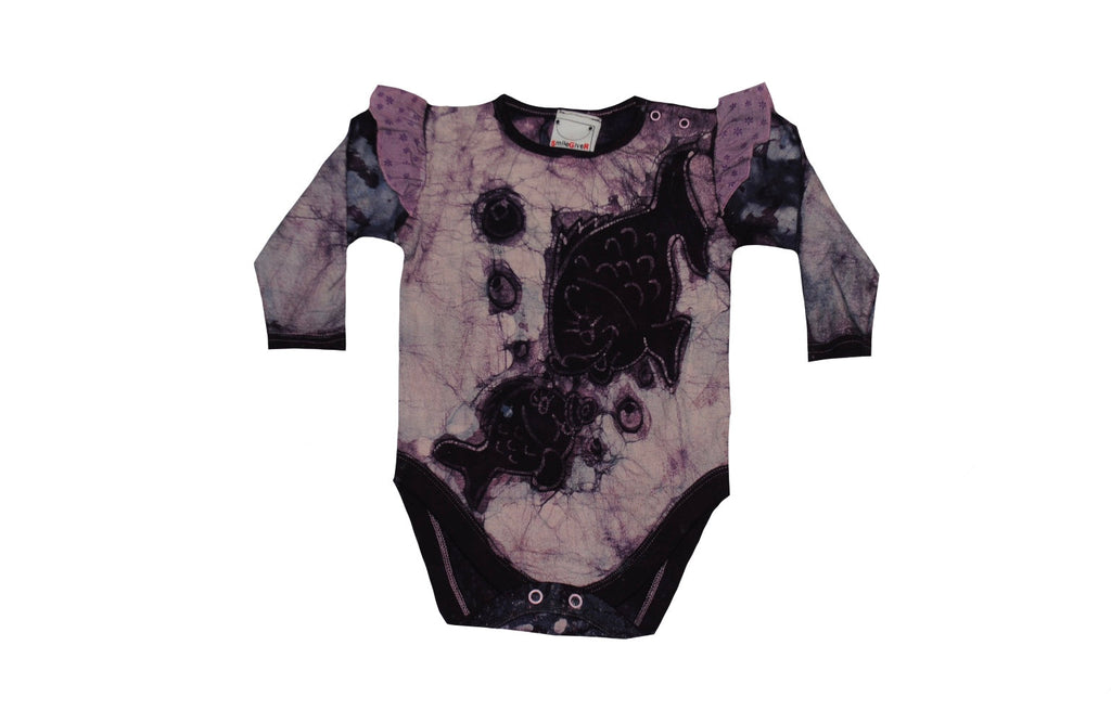 Folded back detail of purple dual fish batik onesie
